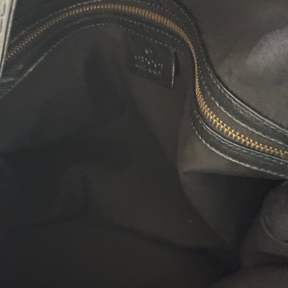 Canvas with leather trim genuine Gucci bag. Very good condition